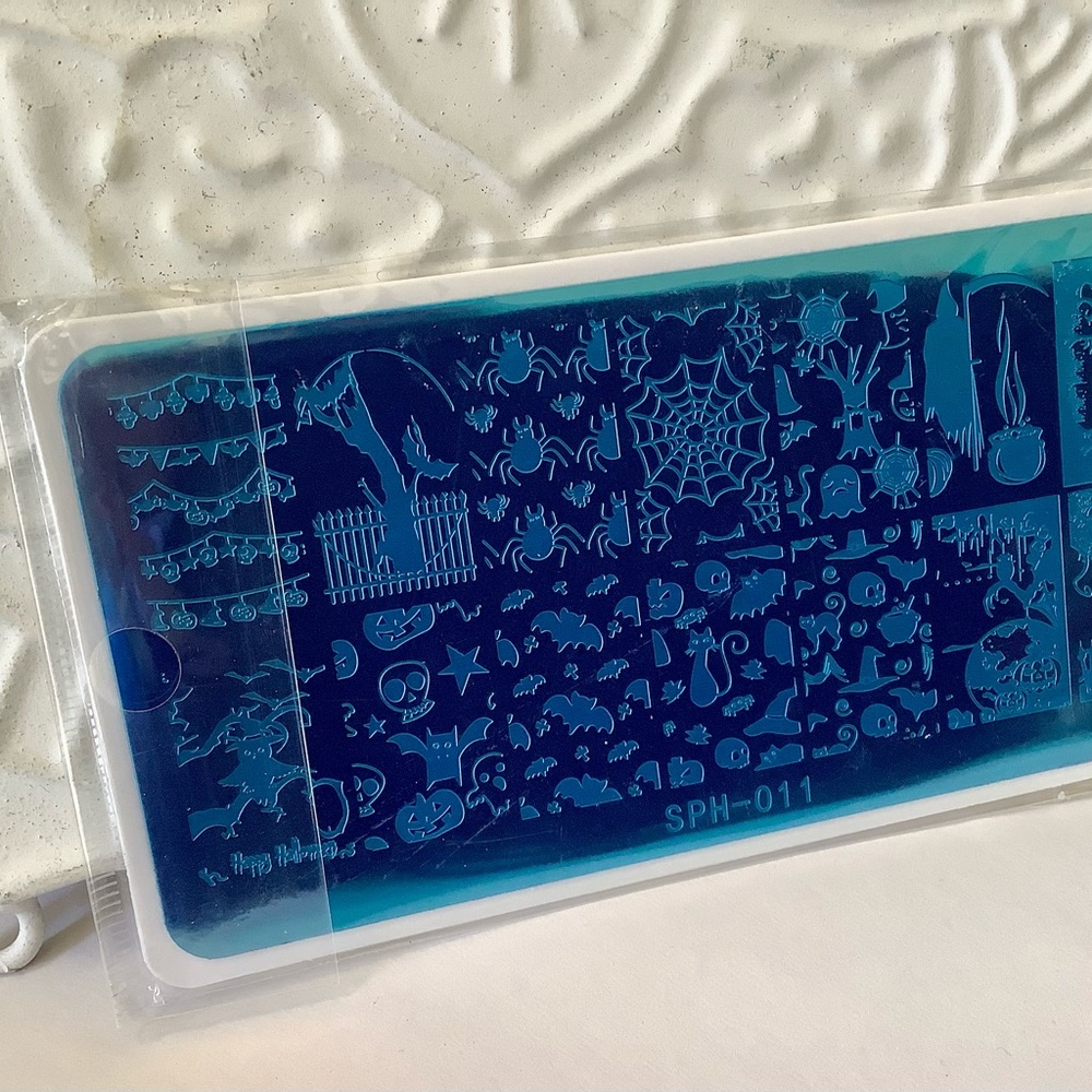 Four Halloween inspired nail art stamping plates
